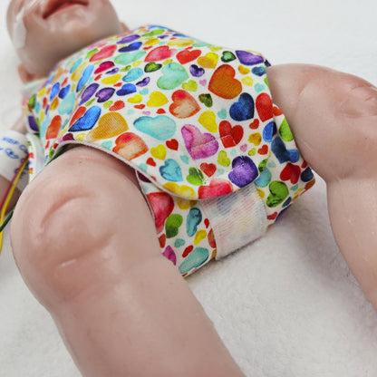 Adaptiver Frühchen Body &quot;Regenbogen Herzen&quot;